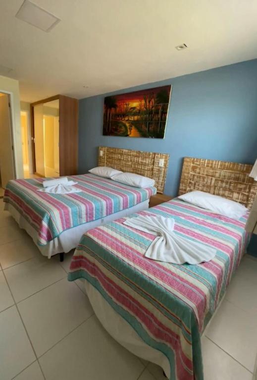 Quarto Triplo com Vista Mar